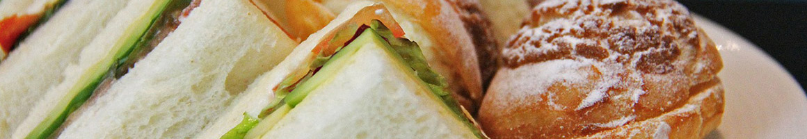 Eating Breakfast & Brunch Sandwich at Sub King restaurant in Signal Hill, CA.